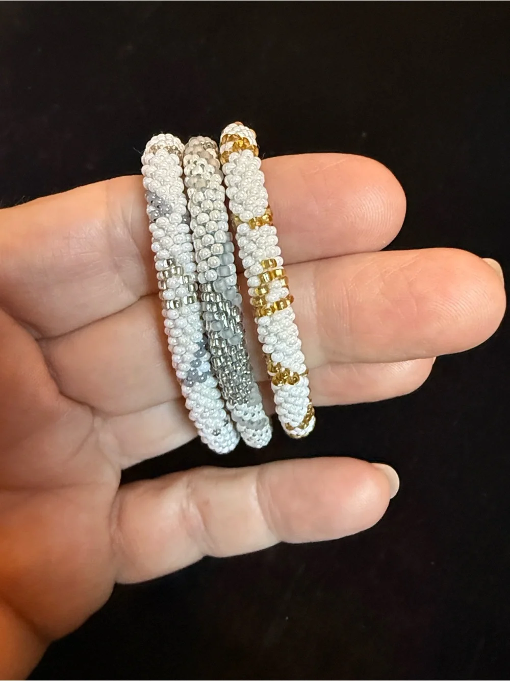 Aid through Trade bracelets making